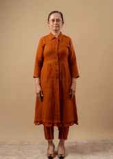 A Model Wearing Orange Organic Cotton Carolle Set, curated by Only Ethikal